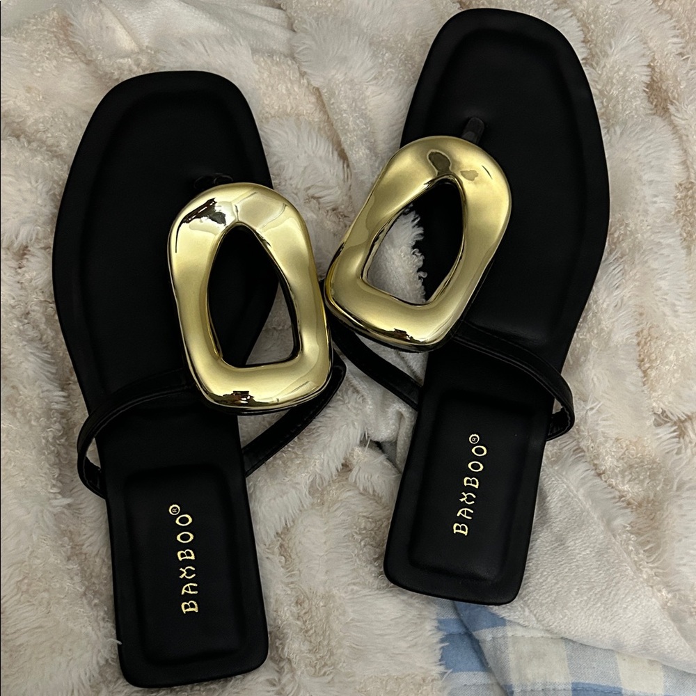 REVOLVE Black and Gold Sandals